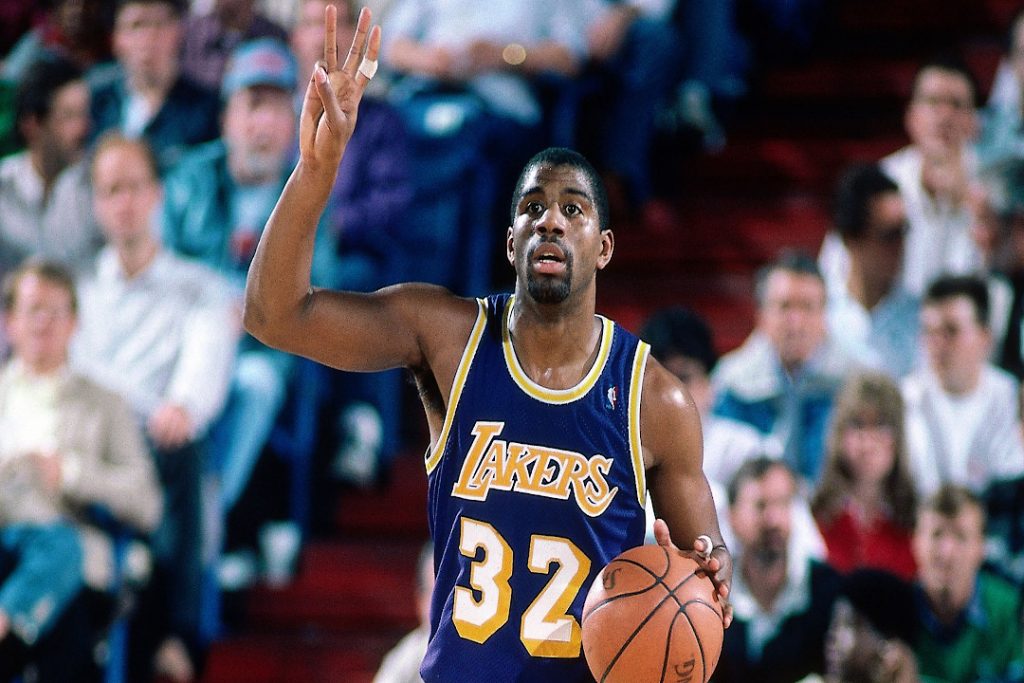 Magic Johnson holding up three fingers